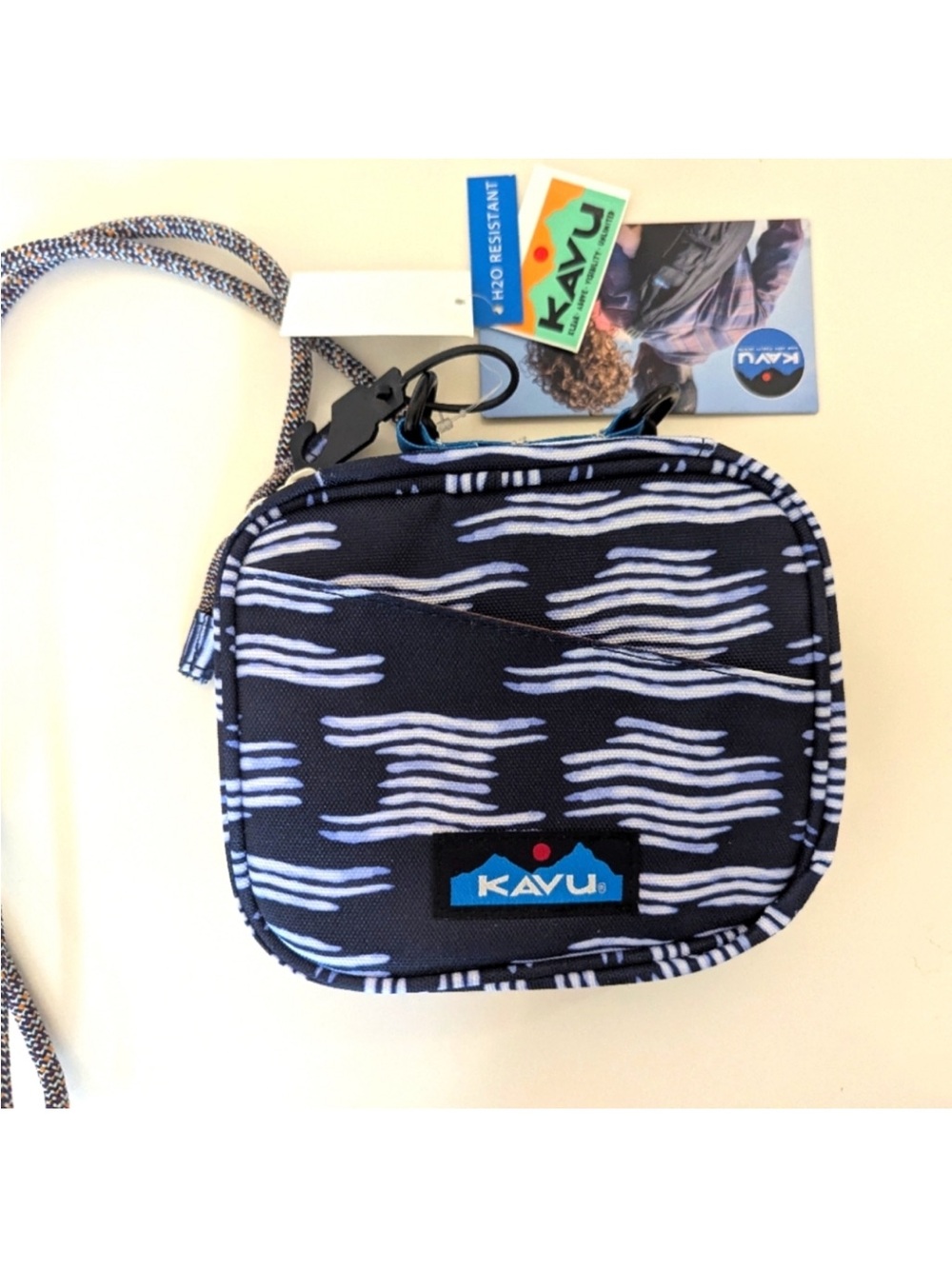 KAVU Safety Cove Case crossbody wallet in the Evening Tide pattern.